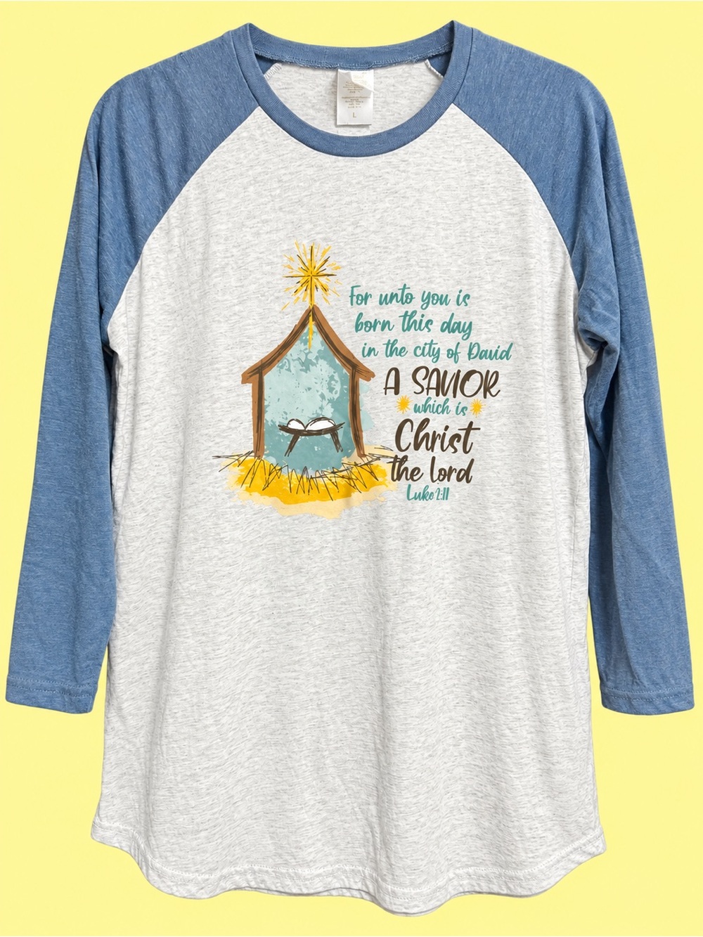Anne Marie Blue Sleeve Raglan Nativity Graphic Tee